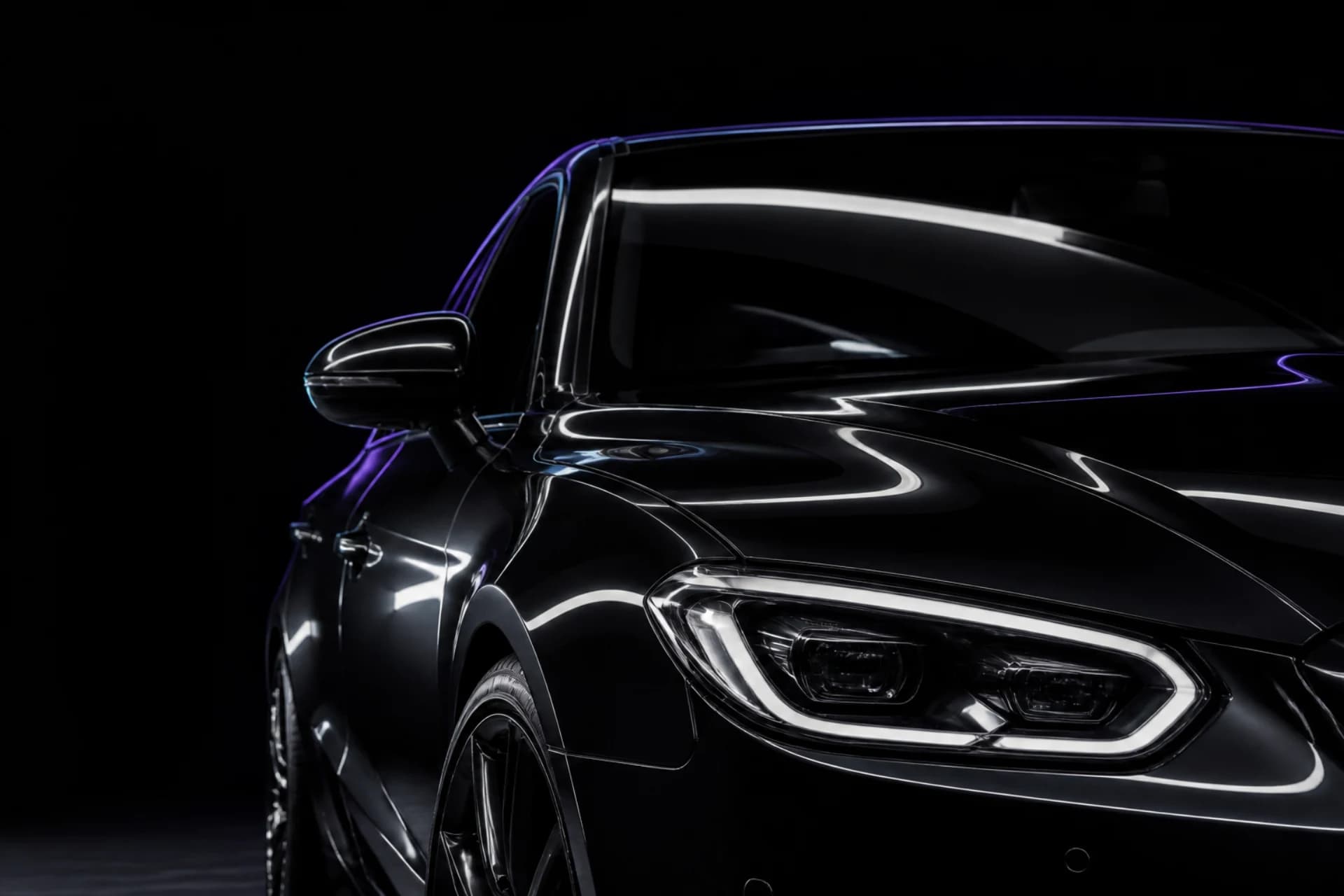 Unbranded black sedan under precise silver and ultraviolet studio reflections
