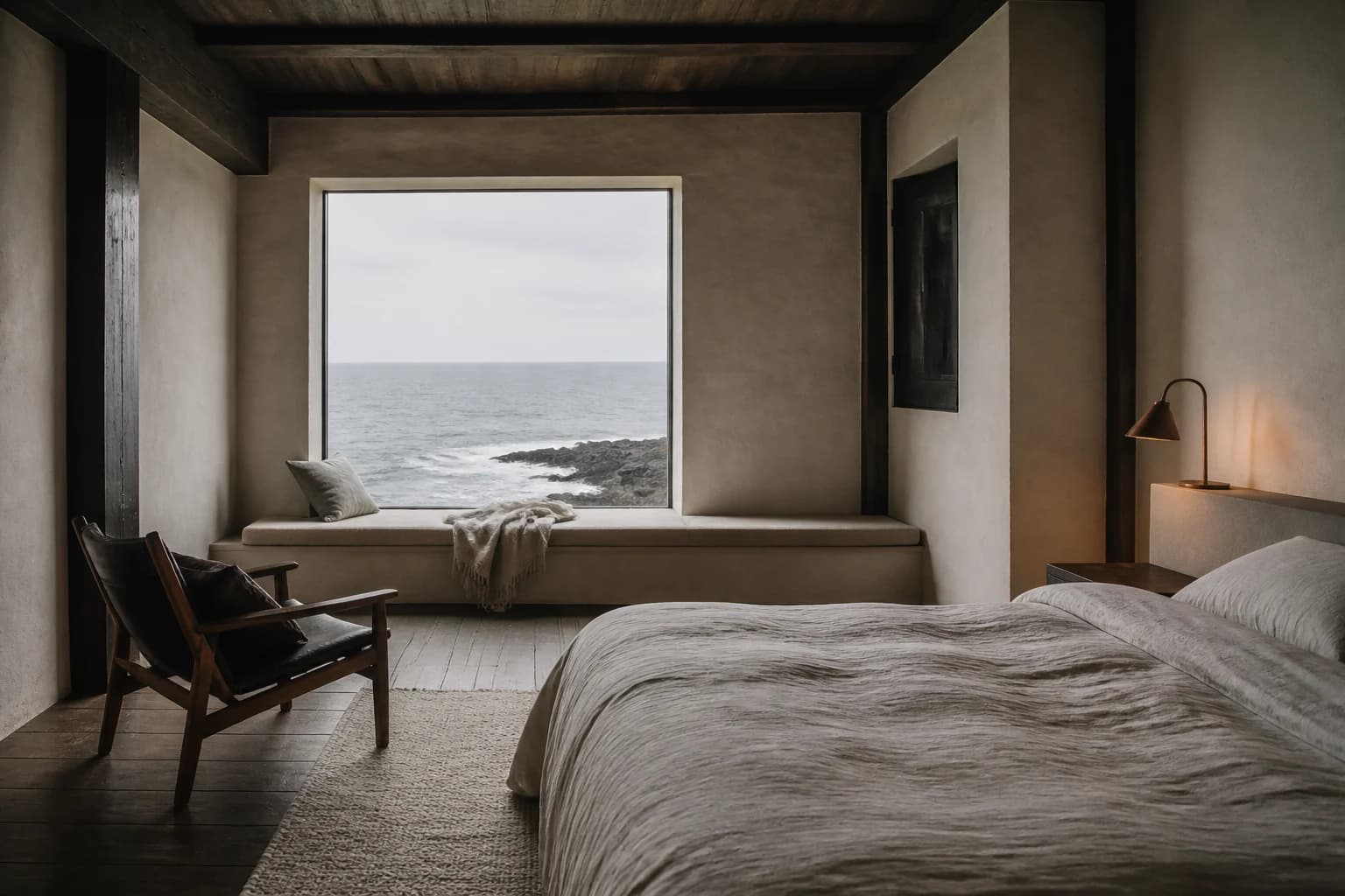 A calm bedroom with a deep window overlooking the Atlantic: The Cliff Room